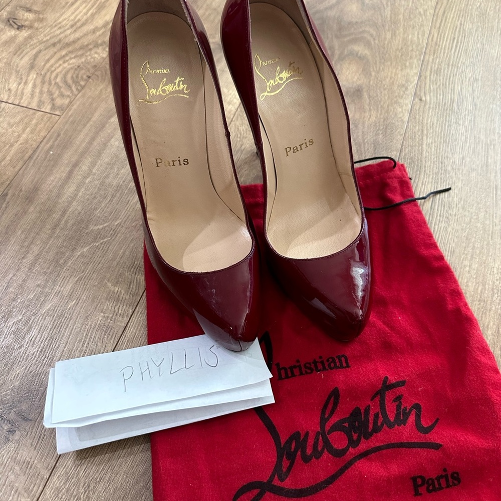 Christian Louboutin burgundy patent Rolandos